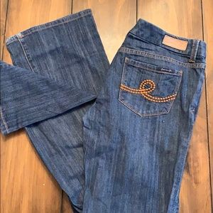 Size 28 Seven jeans. Dark wash. Most likely long.
